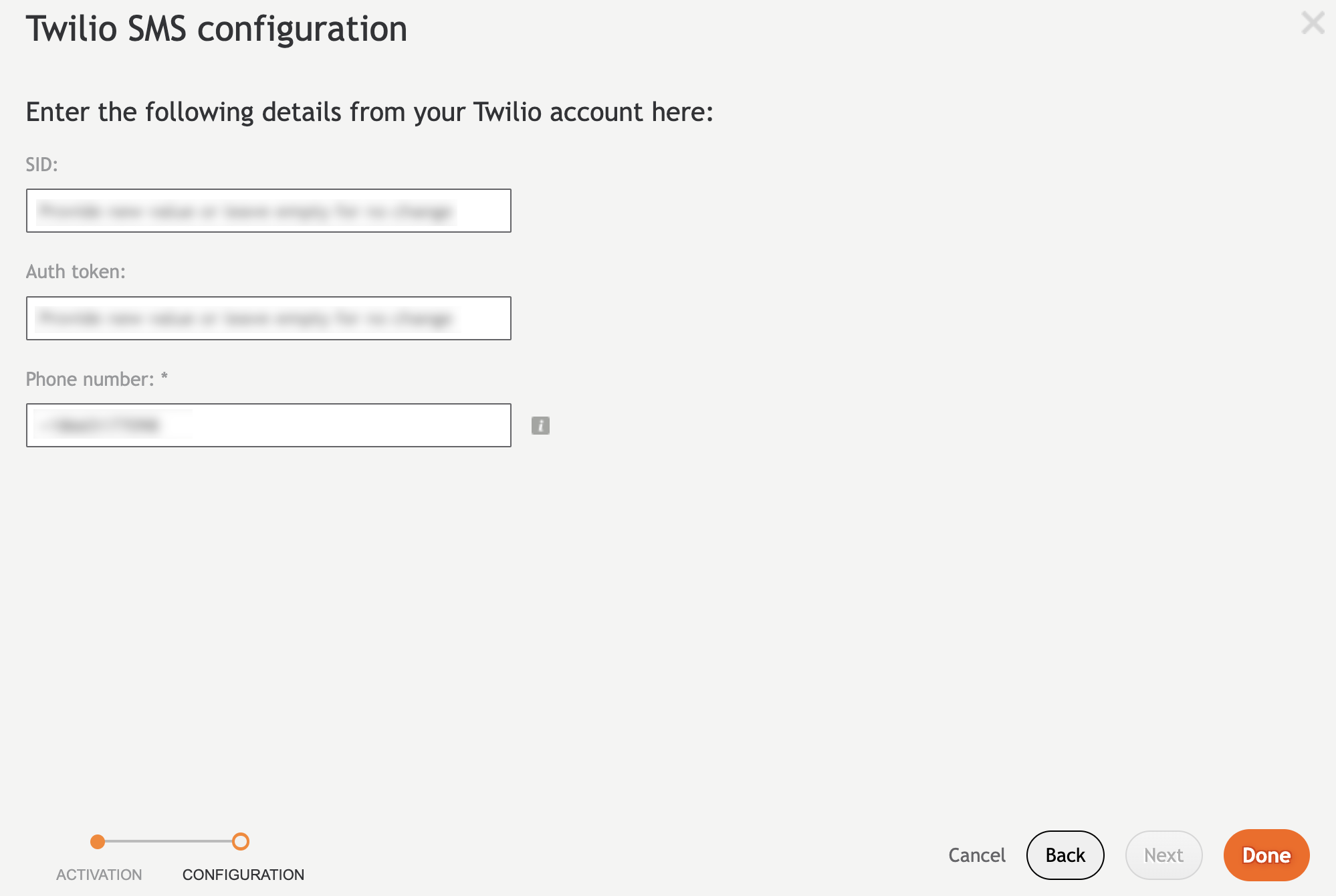 The Twilio SMS configuration dialog where you enter the SID, auth token, and phone number